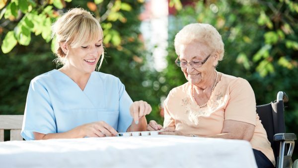 alzheimer's patient with caregiver