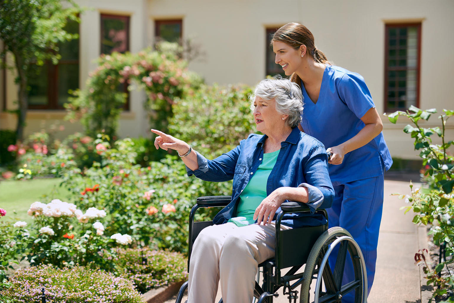 garden-walk-nursing-home-happy-elderly-female-patient-with-woman-caregiver-person-with-disability-retirement