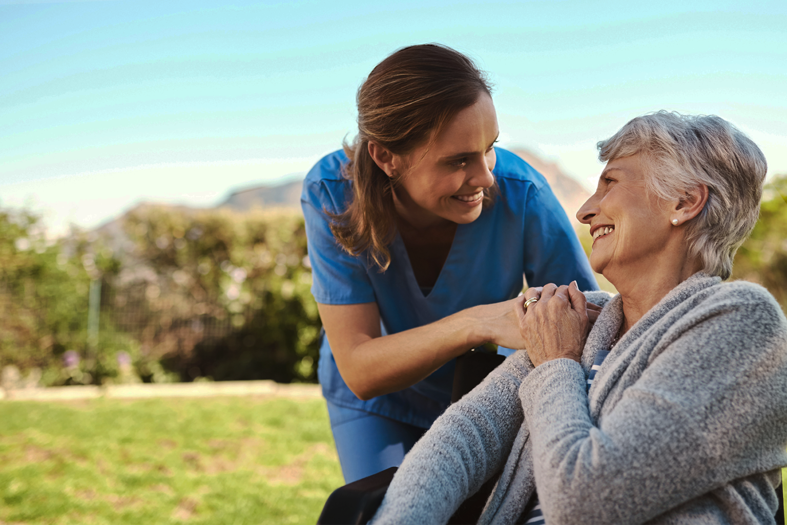 smiling-female-senior-with-caregiver